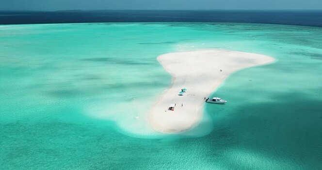 Aerial view of a white sandbank and boat Maldives. Aerial view of a white sandbank and boat Maldives.
