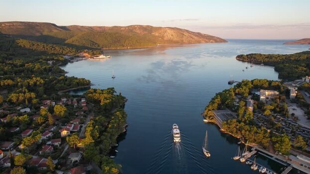 Aerial view of boat and coastal buildings Stari Grad Croatia. Aerial view of boat and coastal buildings Stari Grad Croatia.