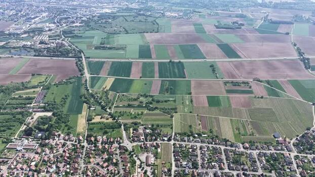 Aerial view of agricultural fields and Selestat town France.