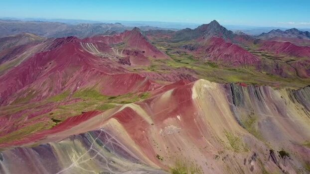 Aerial view of Vinicunca Rainbow Mountain in the Andes Peru. Aerial view of Vinicunca Rainbow Mountain in the Andes Peru.