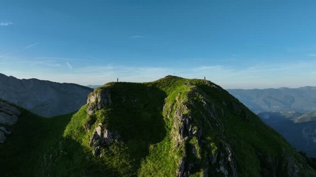 Aerial view of Monte Freddone summit with hikers Italy.