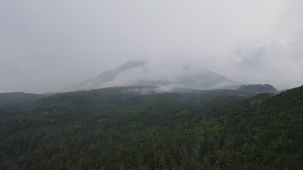 Aerial view of Mount Lawu shrouded in mist and clouds Indonesia. Aerial view of Mount Lawu shrouded in mist and clouds Indonesia.