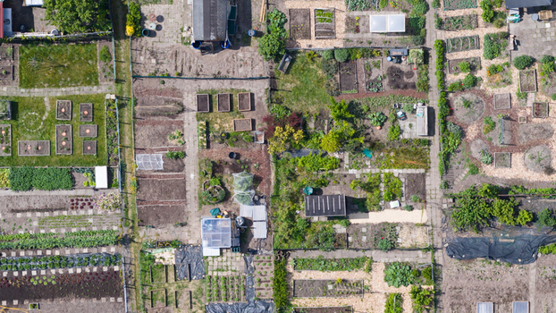 Aerial view of the Amateur Gardeners Association Het Kloosterpark showing organized garden plots small sheds and greenhouses in De Bilt Utrecht Netherlands.
