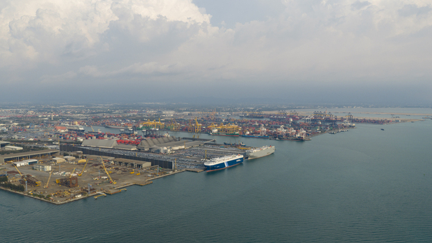 Si Racha District Thailand 08 March 2026 Aerial view of the Laem Chabang International Terminal B 5 Terminal featuring cargo ships docked at the industrial port under a cloudy sky. Si Racha District Thailand 08 March 2026 Aerial view of the Laem Chabang International Terminal B 5 Terminal featuring cargo ships docked at the industrial port under a cloudy sky.
