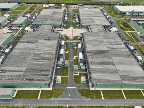 Middenmeer Netherlands 15 June 2026 Aerial view of Microsoft datacenter housings at AMS campus Agriport with back up powerplants and green industrial buildings.