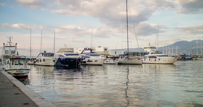 Rijeka Primorje Gorski Kotar Croatia 19 September 2026 View of luxury yachts moored in the harbor with calm water and a cloudy sky in the background. Rijeka Primorje Gorski Kotar Croatia 19 September 2026 View of luxury yachts moored in the harbor with calm water and a cloudy sky in the background.