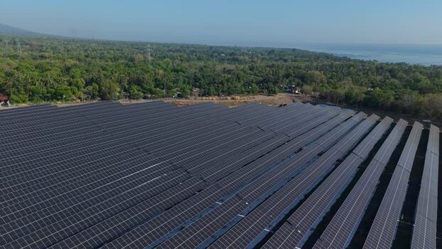 Aerial view of PLTS Bali Timur solar farm in Indonesia. Aerial view of PLTS Bali Timur solar farm in Indonesia.