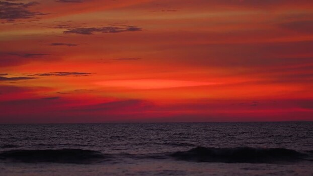 View of a vibrant sunset over the ocean at Cox s Bazar Bangladesh. View of a vibrant sunset over the ocean at Cox s Bazar Bangladesh.