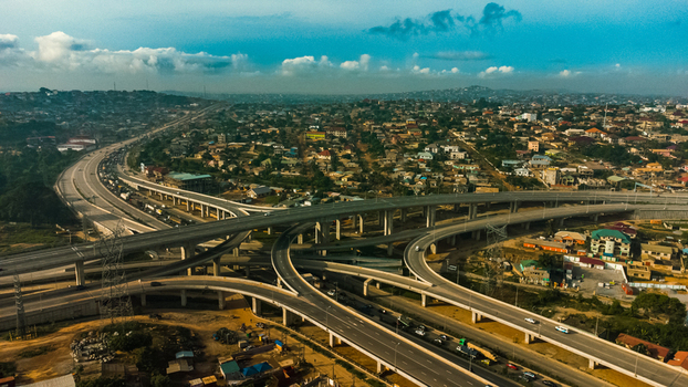 Aerial view of Pokuase Interchange with multi level flyovers surrounding urban residential area and traffic in Ga North Municipal Greater Accra Region Ghana. Aerial view of Pokuase Interchange with multi level flyovers surrounding urban residential area and traffic in Ga North Municipal Greater Accra Region Ghana.