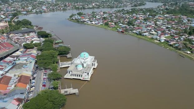 Aerial view of Kuching Mosque on the Sarawak River Malaysia. Aerial view of Kuching Mosque on the Sarawak River Malaysia.