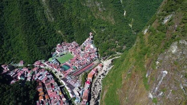 Aerial view of Aguas Calientes nestled in the Andes mountains Peru.