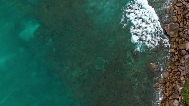 Aerial view of turquoise water and rocky shore Seychelles. Aerial view of turquoise water and rocky shore Seychelles.