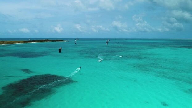 Aerial view of kitesurfers in Los Roques archipelago Venezuela.