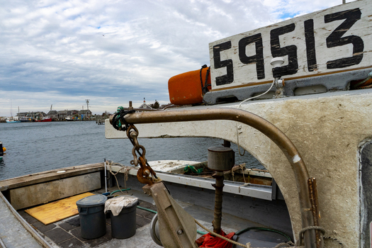 Edgartown United States 14 May 2026 View of the deck of a fishing boat at Martha s Vineyard with fishing gear and the harbor in the background.