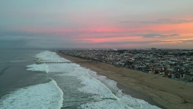 Aerial view of Manhattan Beach pier at sunset United States.