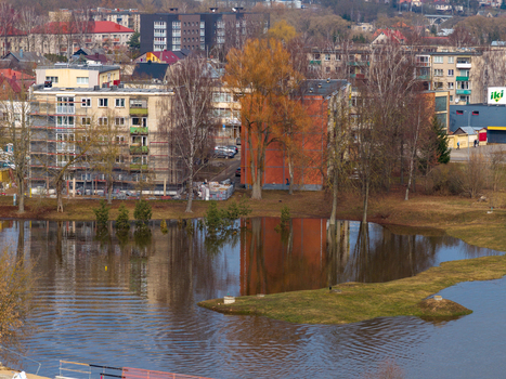 Kedainiai Lithuania 17 March 2026 Aerial view of the flooded park area and residential buildings with scaffolding reflecting in the water in the town of Kedainiai. Kedainiai Lithuania 17 March 2026 Aerial view of the flooded park area and residential buildings with scaffolding reflecting in the water in the town of Kedainiai.