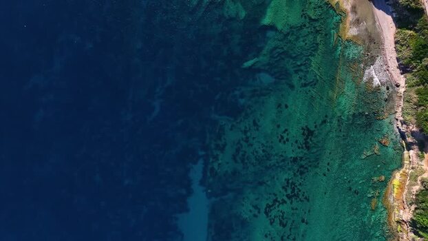 Aerial view of the turquoise waters and rocky coastline Italy. Aerial view of the turquoise waters and rocky coastline Italy.