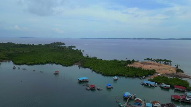 Aerial view of stilt houses on Batam Island Indonesia. Aerial view of stilt houses on Batam Island Indonesia.