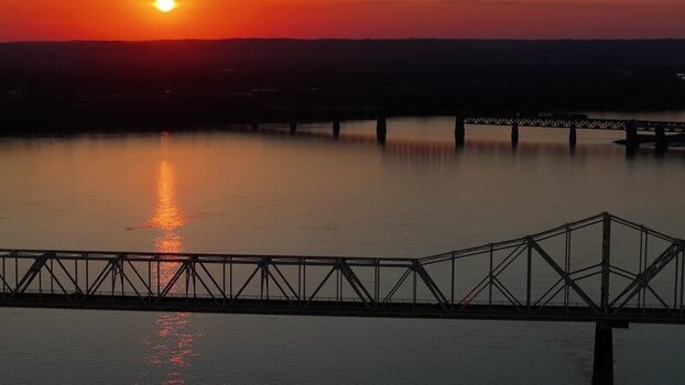 Aerial view of a bridge over the Ohio River at sunset United States. Aerial view of a bridge over the Ohio River at sunset United States.