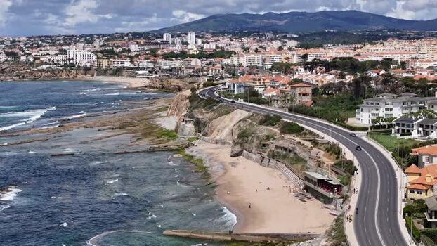 Aerial view of the coastal road and beach in Parede Portugal.