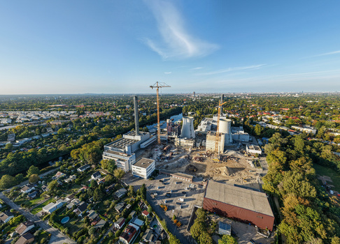 Aerial view of the deconstruction of the Combined Heat and Power Plant Lichterfelde with cooling towers cranes and industrial structures amidst residential areas in Berlin Berlin Germany. Aerial view of the deconstruction of the Combined Heat and Power Plant Lichterfelde with cooling towers cranes and industrial structures amidst residential areas in Berlin Berlin Germany.