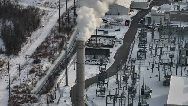Aerial view of an industrial facility with smoke in Reading United States. Aerial view of an industrial facility with smoke in Reading United States.