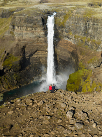 Aerial view of the powerful Háifoss waterfall cascading down rugged cliffs creating a misty spectacle of nature s force Haifoss Skeiða og Gnúpverjahreppur Iceland. Aerial view of the powerful Háifoss waterfall cascading down rugged cliffs creating a misty spectacle of nature s force Haifoss Skeiða og Gnúpverjahreppur Iceland.