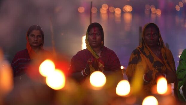 View of women performing a religious ritual in Bangladesh. View of women performing a religious ritual in Bangladesh.