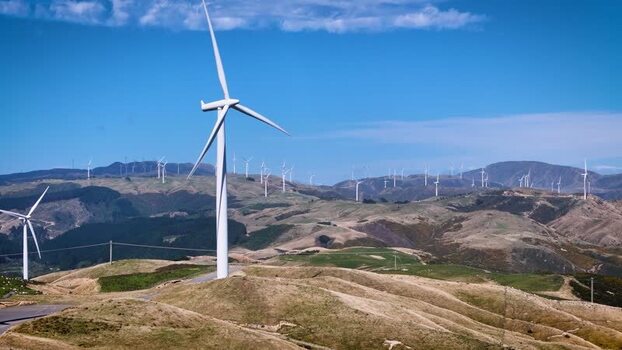 Aerial view of Makara Wind Farm turbines on hills New Zealand. Aerial view of Makara Wind Farm turbines on hills New Zealand.