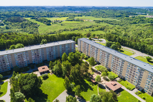 Aerial view of Rannebergen residential area with apartment buildings surrounded by lush green forests and parks in Gothenburg Vastra Gotaland County Sweden. Aerial view of Rannebergen residential area with apartment buildings surrounded by lush green forests and parks in Gothenburg Vastra Gotaland County Sweden.