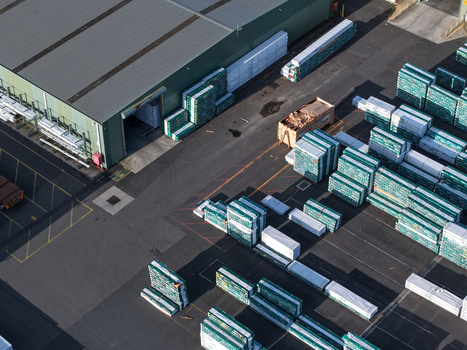 Melbourne Australia 22 September 2026 Aerial view of industrial factory premises in Kilsyth featuring large stacks of construction materials and pallets in an outdoor storage yard. Melbourne Australia 22 September 2026 Aerial view of industrial factory premises in Kilsyth featuring large stacks of construction materials and pallets in an outdoor storage yard.