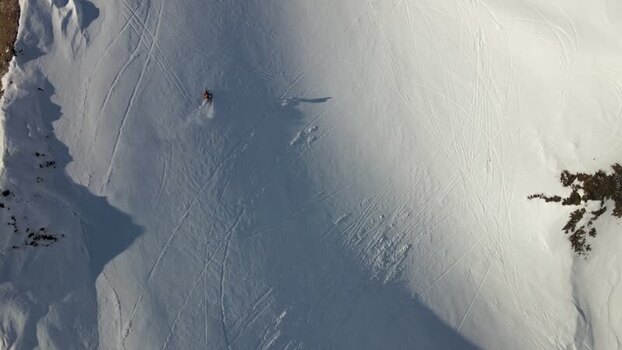 Aerial view of a person skiing on Moskardshnjukar Trail Iceland. Aerial view of a person skiing on Moskardshnjukar Trail Iceland.