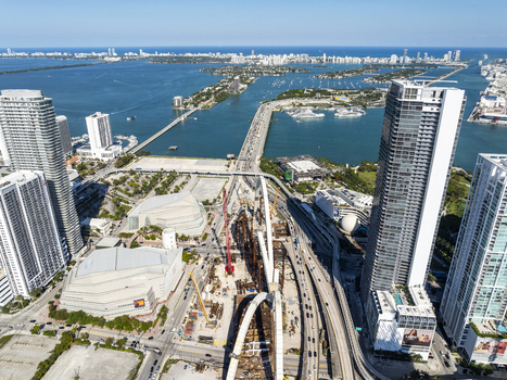 Aerial view of a vibrant cityscape where gleaming skyscrapers meet the turquoise waters of Biscayne Bay under the clear blue sky Miami Florida USA. Aerial view of a vibrant cityscape where gleaming skyscrapers meet the turquoise waters of Biscayne Bay under the clear blue sky Miami Florida USA.