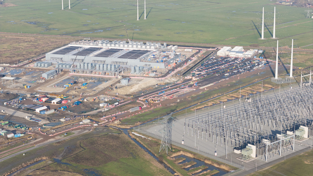 Groningen Netherlands 20 January 2026 Aerial view of Datacenter Westpoort featuring the large industrial facility parking area and electrical substation in the countryside.