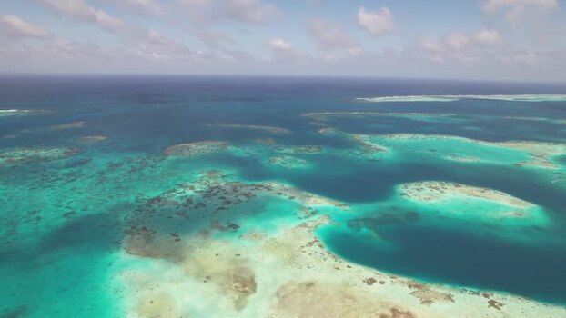 Aerial view of Los Roques archipelago with turquoise waters Venezuela.