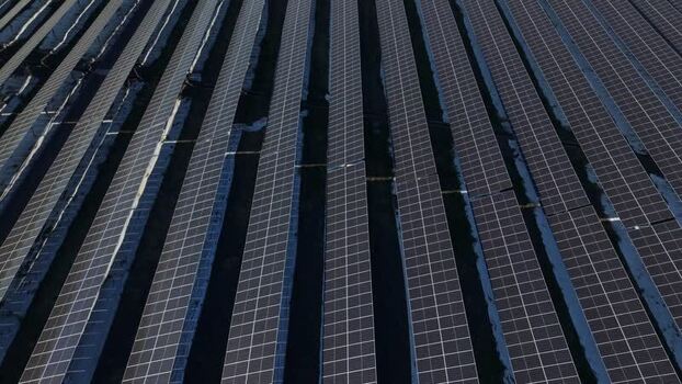 Aerial view of PLTS Bali Timur solar farm in Indonesia. Aerial view of PLTS Bali Timur solar farm in Indonesia.