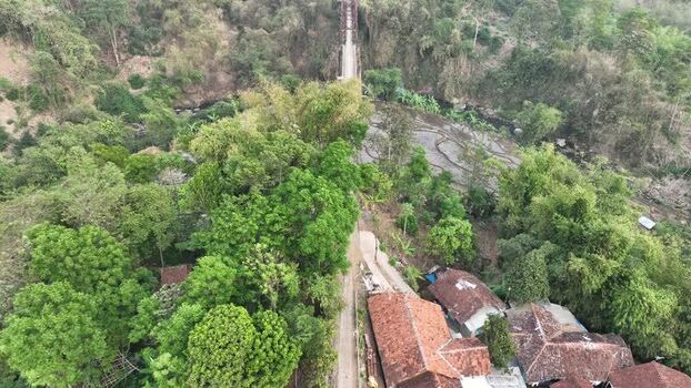 Aerial view of bridge over river in Soreang Indonesia. Aerial view of bridge over river in Soreang Indonesia.