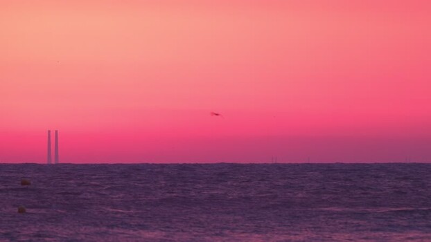 View of distant towers over the sea France.