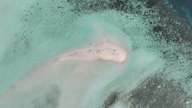 Aerial view of Pasir Timbul Mansuar sandbar in Indonesia.