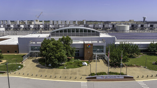Clarksville Tennessee United States 04 July 2026 Aerial view of the Google Data Center in Montgomery County featuring industrial cooling units solar panels and a landscaped entrance.