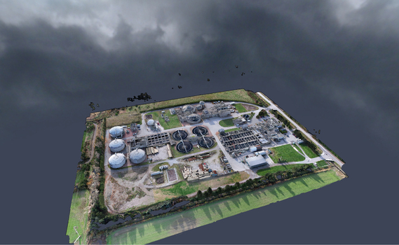 Aerial view of a wastewater treatment plant featuring circular sedimentation tanks and industrial infrastructure surrounded by green fields in Richmond British Columbia Canada. Aerial view of a wastewater treatment plant featuring circular sedimentation tanks and industrial infrastructure surrounded by green fields in Richmond British Columbia Canada.