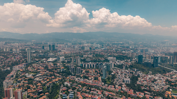 Aerial view of the Paseo Arcos Bosques complex surrounded by dense urban development and lush greenery in Ciudad de Mexico Ciudad de Mexico Mexico. Aerial view of the Paseo Arcos Bosques complex surrounded by dense urban development and lush greenery in Ciudad de Mexico Ciudad de Mexico Mexico.