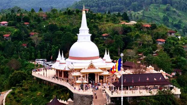 Aerial view of a Buddhist stupa on a hill in Sri Lanka.