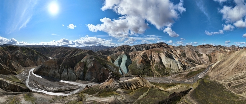 Aerial view of the colorful rhyolite mountains of Landmannalaugar with winding river channels and volcanic terrain Hella Rangarthing ytra Iceland. Aerial view of the colorful rhyolite mountains of Landmannalaugar with winding river channels and volcanic terrain Hella Rangarthing ytra Iceland.