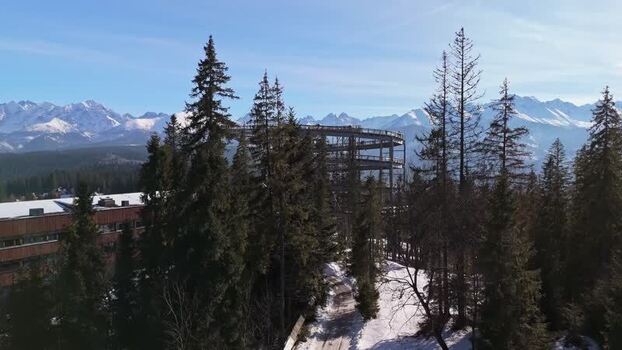 Aerial view of SkyWalk Serce Poronina above snowy Tatra forest Aerial view of SkyWalk Serce Poronina above snowy Tatra forest