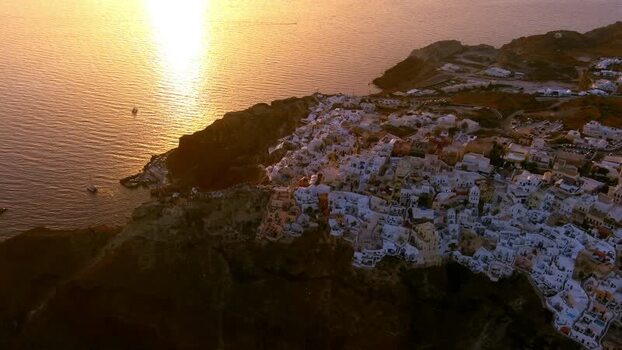 Aerial view of Santorini cliffs at sunset Greece. Aerial view of Santorini cliffs at sunset Greece.
