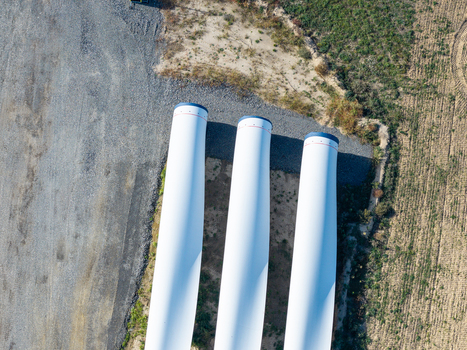 Aerial view of wind turbine blades stored at Windpark Forst Briesnig II on recultivated land of the former Janschwalde open pit mine in Forst Brandenburg Germany. Aerial view of wind turbine blades stored at Windpark Forst Briesnig II on recultivated land of the former Janschwalde open pit mine in Forst Brandenburg Germany.