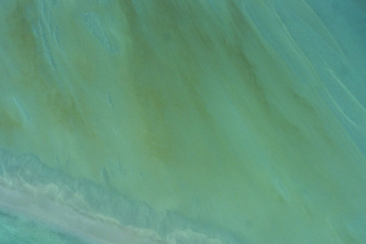 Aerial view of ocean patterns in the shallow turquoise waters of the coast in Shire of Shark Bay Western Australia Australia. Aerial view of ocean patterns in the shallow turquoise waters of the coast in Shire of Shark Bay Western Australia Australia.