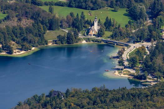 Aerial view of Lake Bohinj with the Church of St. John the Baptist. Aerial view of Lake Bohinj with the Church of St. John the Baptist.