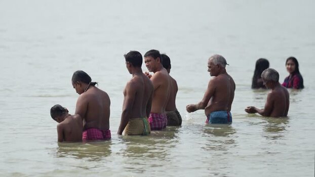 View of people bathing in the river in Godagari Bangladesh. View of people bathing in the river in Godagari Bangladesh.